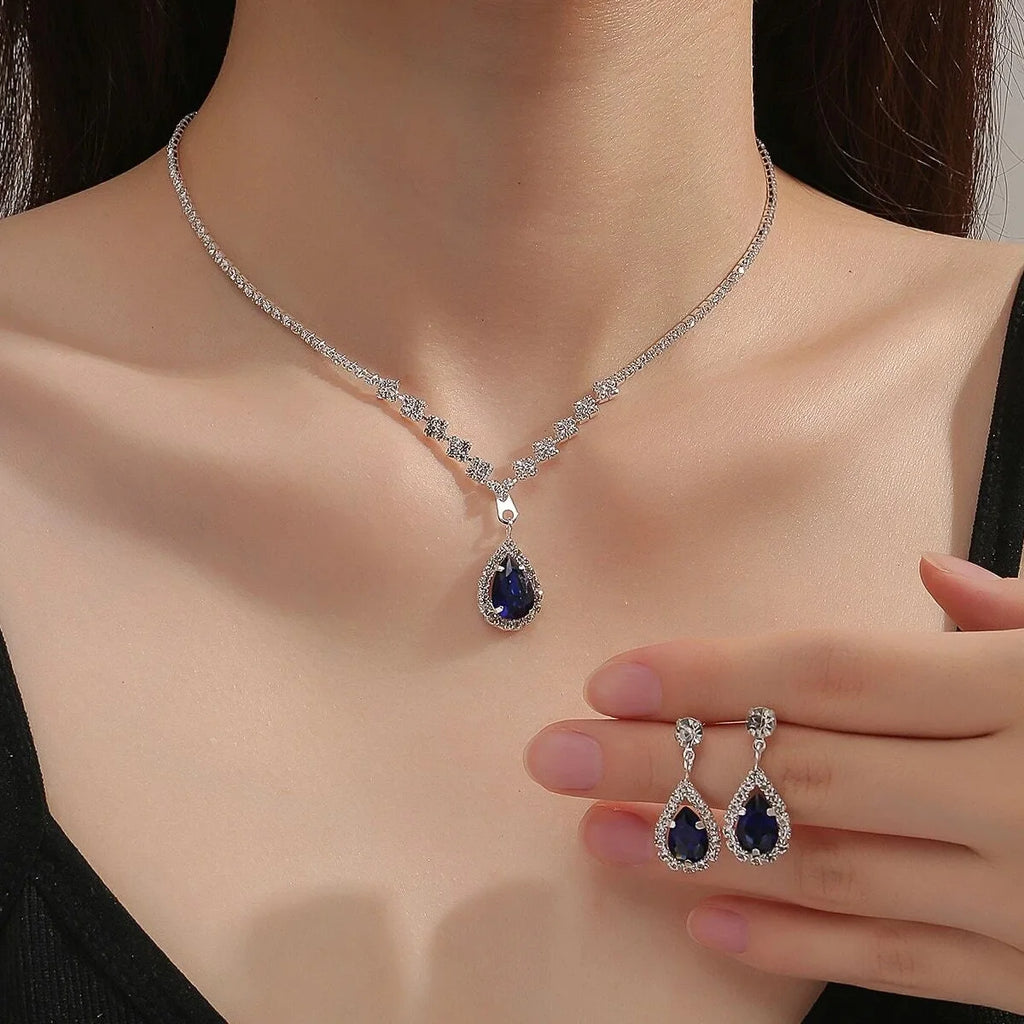 Elegantes Tropfen Schmuckset - Halskette & Ohrringe